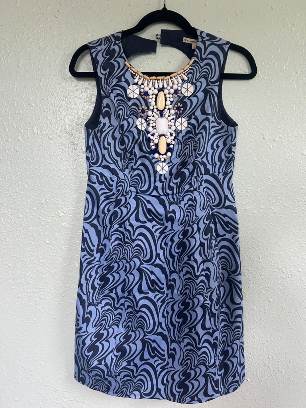 Blue Swirl Sleeveless Sheath Dress with Statement Neck